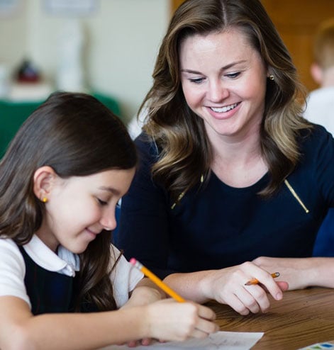 teacher and student studying together