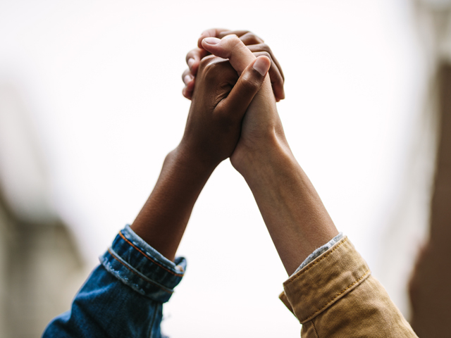 racism-holding-hands-640-480