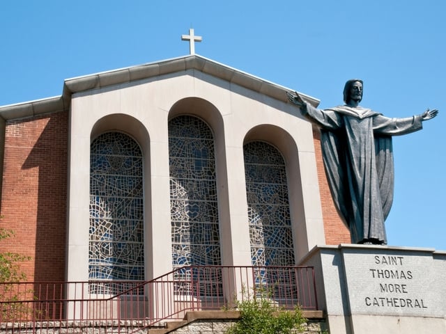 front of church with statue