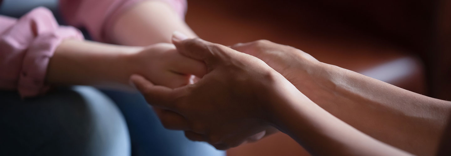hands supporting 1440x500