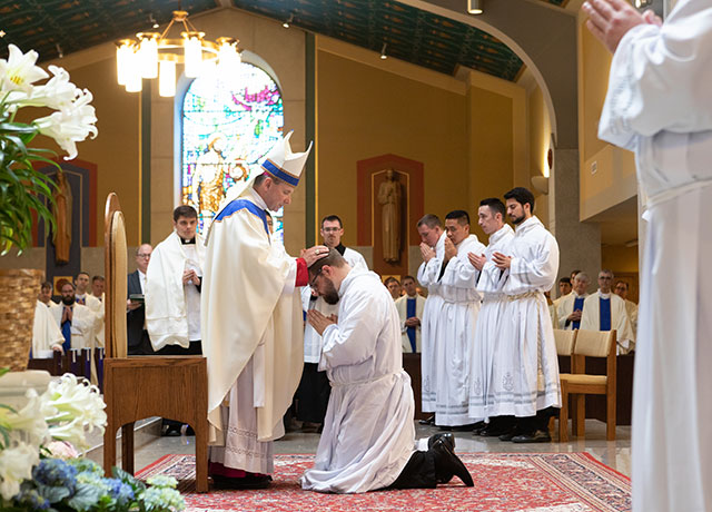 bishop with newly ordained transitional deacon