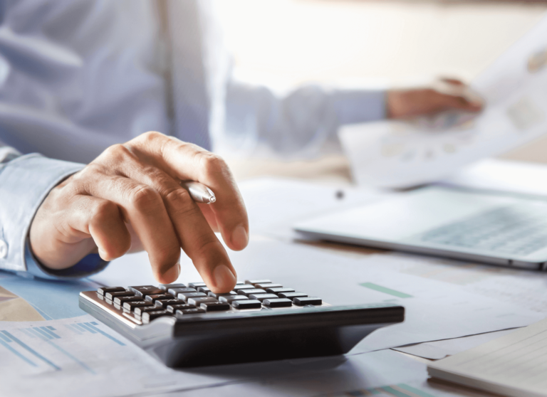 man using a calculator